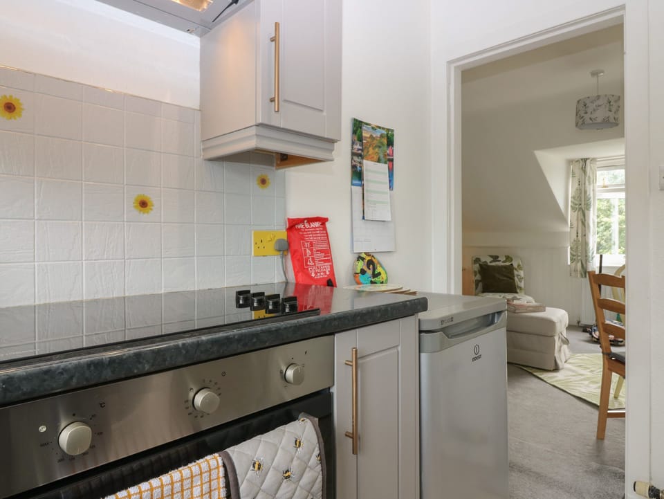 Fridge, electric kettle, toaster, cookware/dishes/utensils