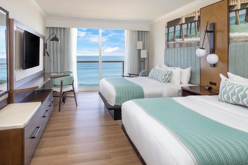 Premium bedding, down comforters, pillowtop beds, in-room safe