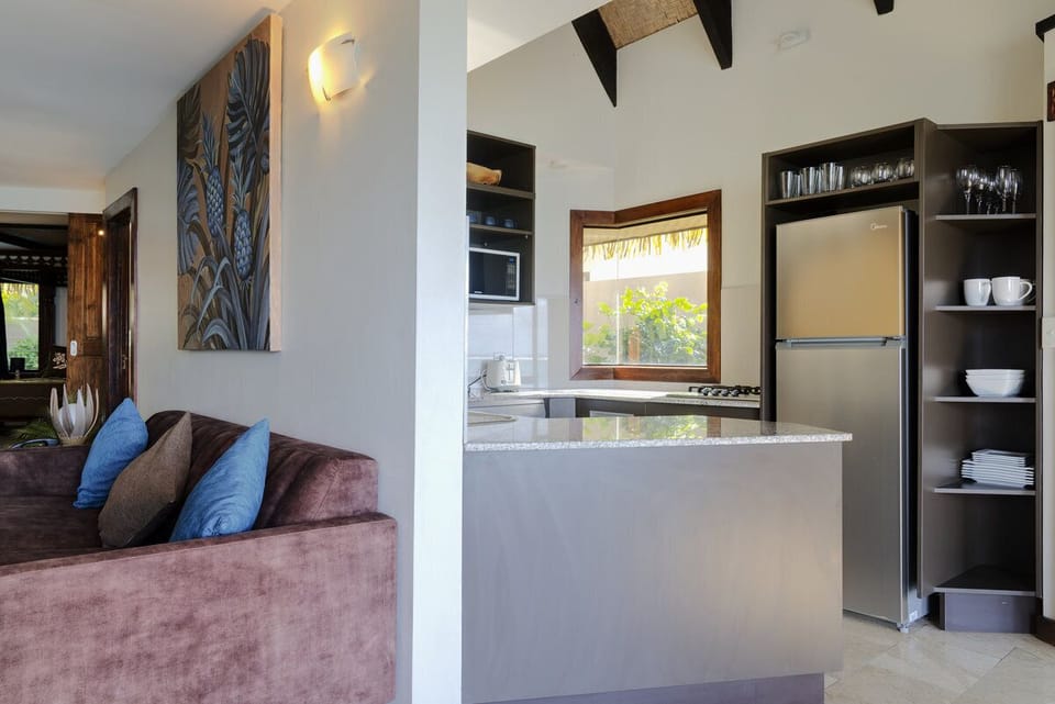 Luxury Villa, Private Pool, Beachfront | Private kitchen | Full-size fridge, microwave, stovetop, dishwasher
