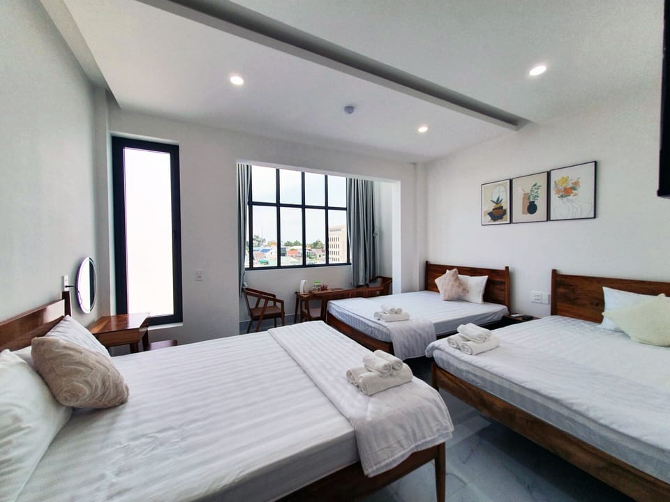 Panoramic Triple Room | Desk, blackout drapes, iron/ironing board, free WiFi