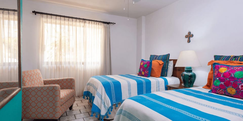 Economy Apartment, 2 Bedrooms, Kitchen, Beach View | 2 bedrooms, in-room safe, free WiFi, bed sheets