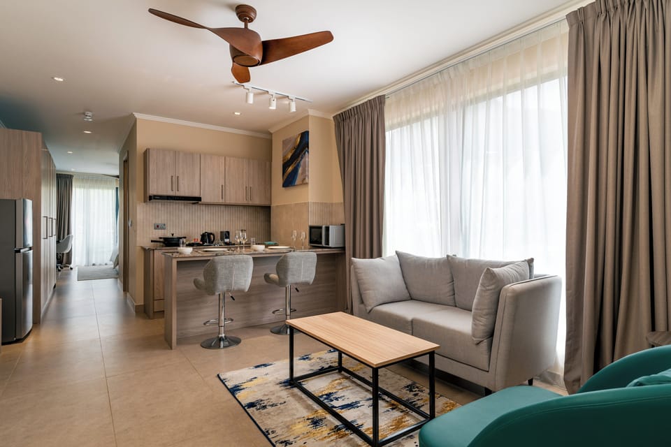Double room with Balcony | Living area | 49-inch LED TV with cable channels