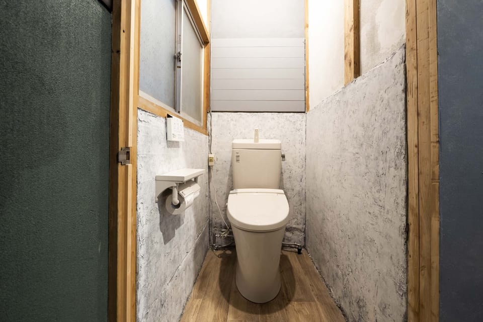 Economy Room | Bathroom | Shower, slippers