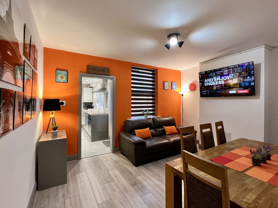 Family House | Living area | 55-inch Smart TV with digital channels, Netflix, streaming services