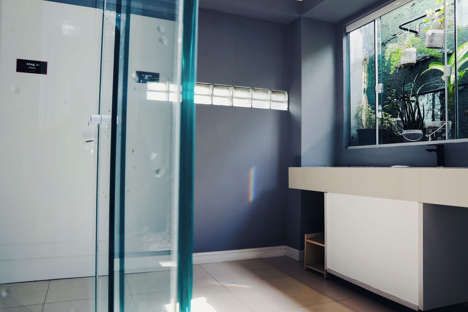 Exclusive Studio Suite, 1 Queen Bed, Private Bathroom | Bathroom | Shower, hair dryer, towels, soap