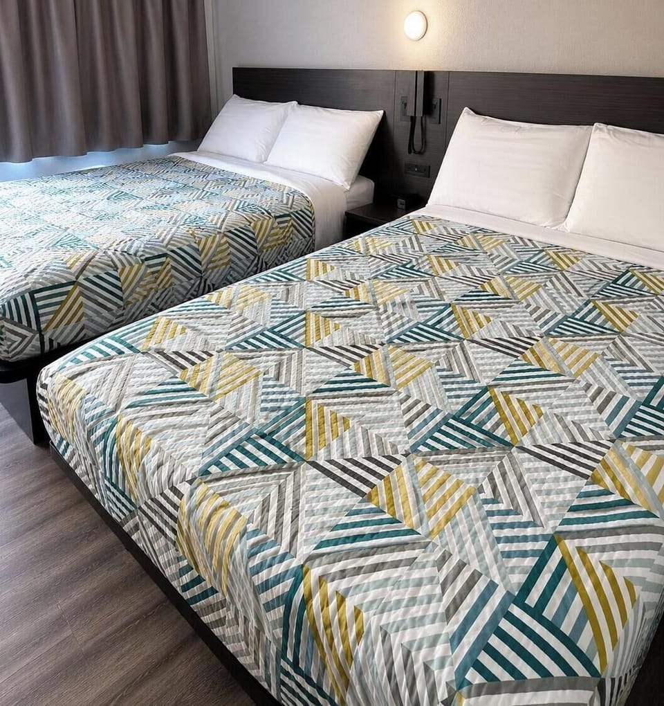 Deluxe Room, 2 Double Beds, Non Smoking, Refrigerator & Microwave | WiFi (free), bed sheets