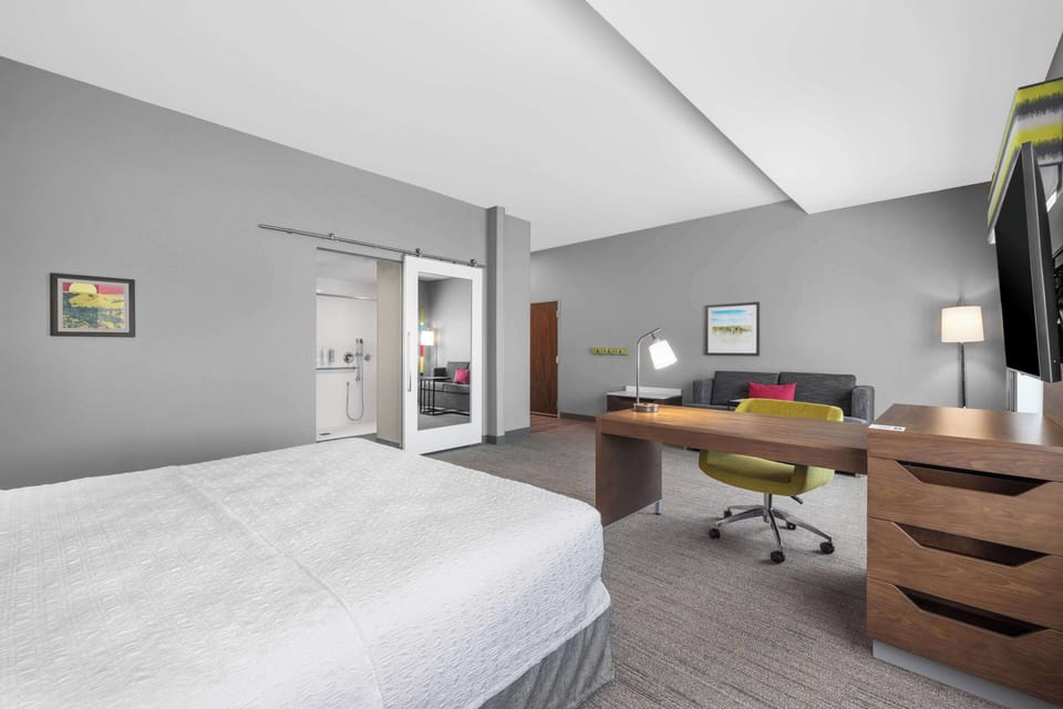 Studio, 1 King Bed, Accessible (Mobility & Hearing, Roll-in Shower) | Living area | 55-inch LED TV with digital channels, Netflix, streaming services