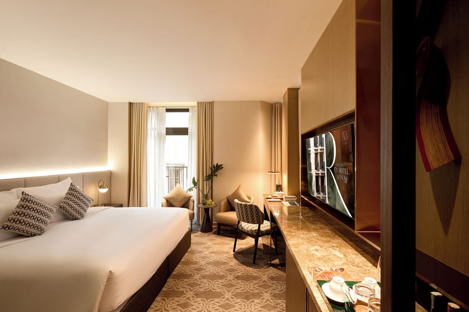 Deluxe Double Room | Minibar, in-room safe, desk, blackout drapes