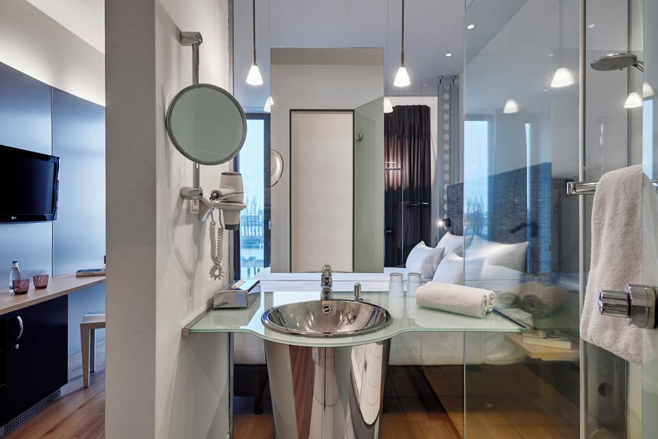 Shower, free toiletries, hair dryer, towels
