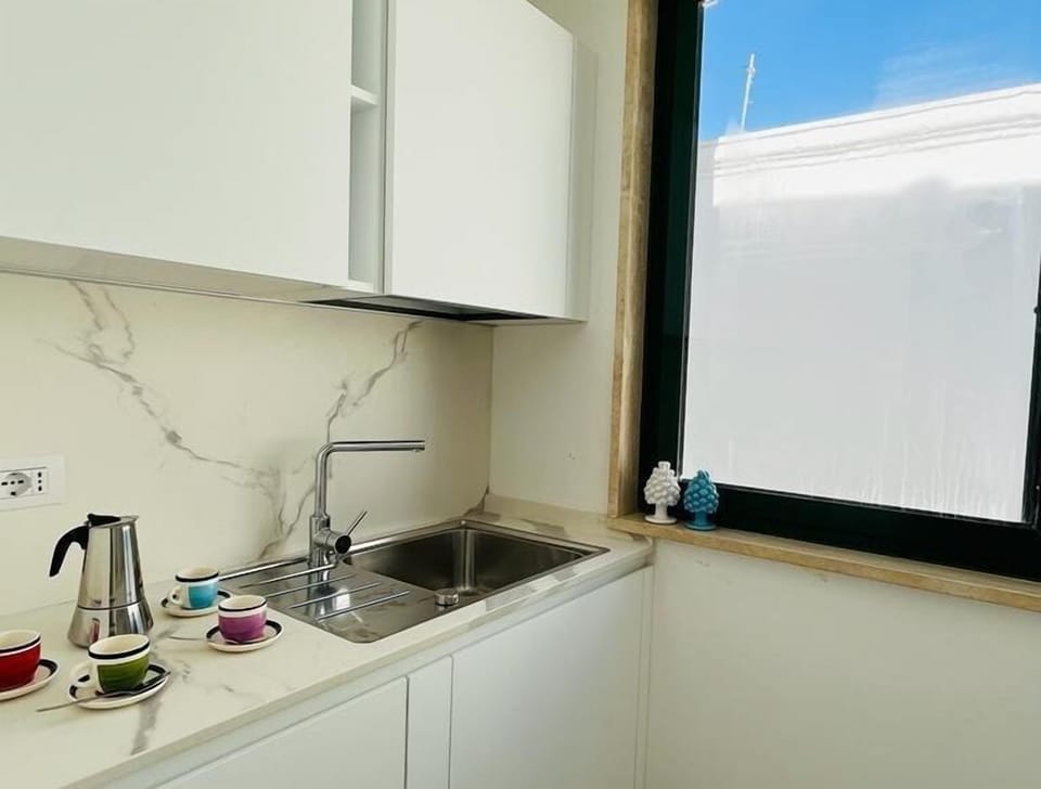 Apartment | Private kitchen | Full-size fridge, microwave, stovetop, cookware/dishes/utensils