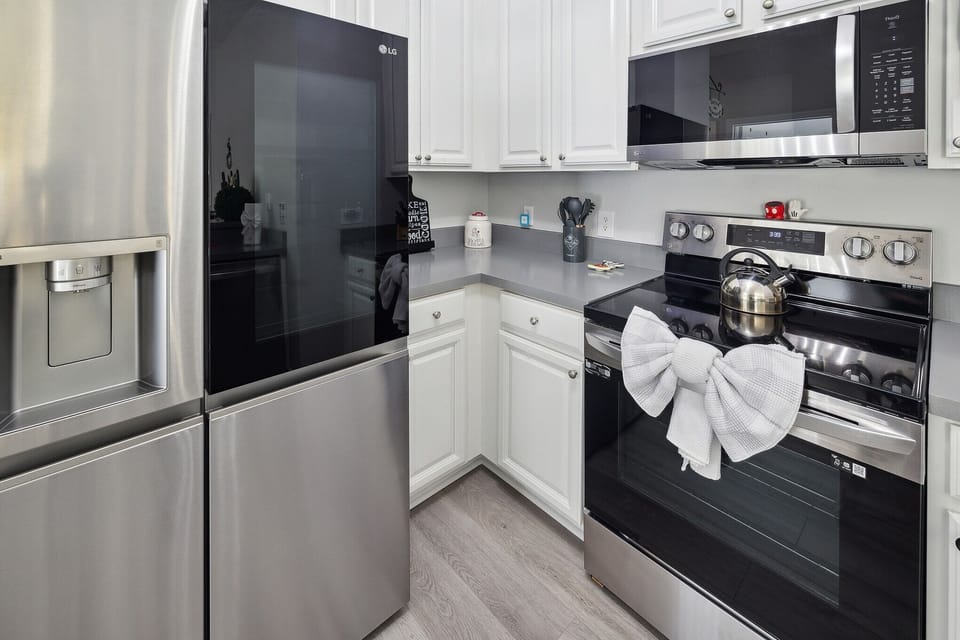 Townhome, 3 Bedrooms | Private kitchen | Coffee/tea maker, fridge, oven, toaster