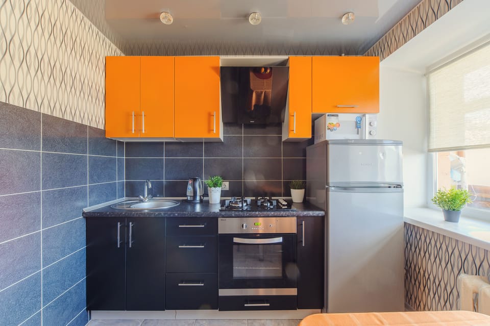 Classic Apartment | Private kitchen | Full-size fridge, microwave, oven, stovetop