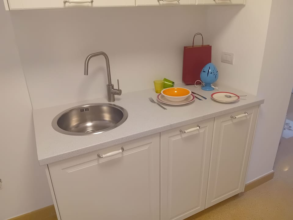 Comfort Apartment | Private kitchen | Full-size fridge, stovetop, cookware/dishes/utensils