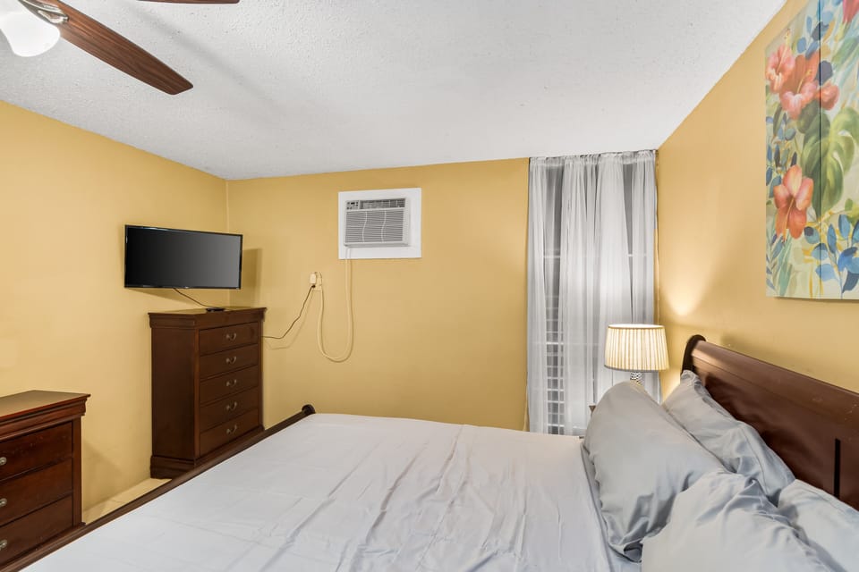 Condo, 1 Bedroom | 1 bedroom, desk, laptop workspace, iron/ironing board