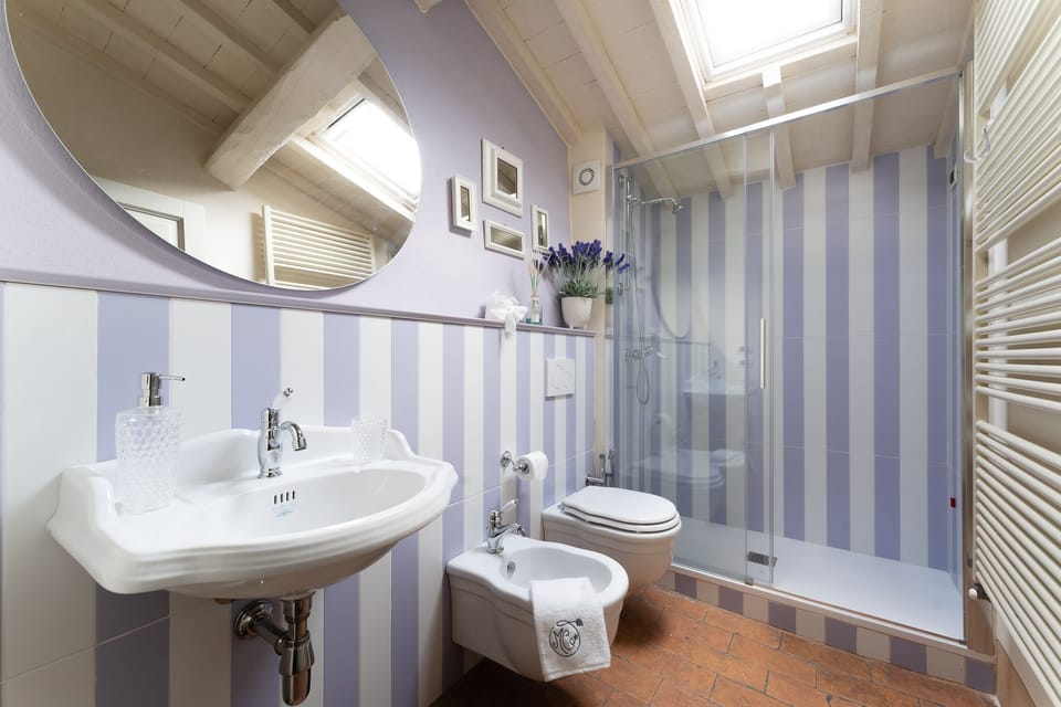 Deluxe Triple Room | Bathroom | Shower, designer toiletries, hair dryer, bathrobes