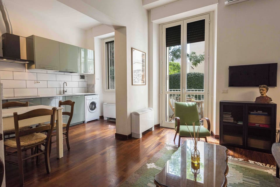 Comfort Apartment | Living area | 40-inch flat-screen TV with digital channels
