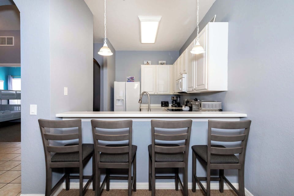 Condo, Multiple Beds, Pool Access, Garden View (Dreamers Oasis At Bahama Bay) | Private kitchen | Fridge, microwave, oven, stovetop