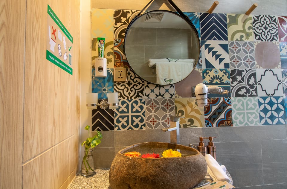 Deluxe Studio | Bathroom | Shower, rainfall showerhead, designer toiletries, hair dryer