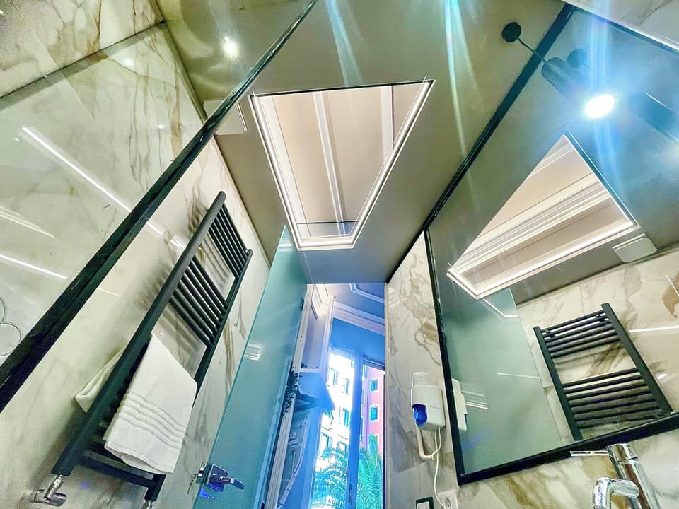Superior Room | Bathroom | Shower, rainfall showerhead, hair dryer, bidet