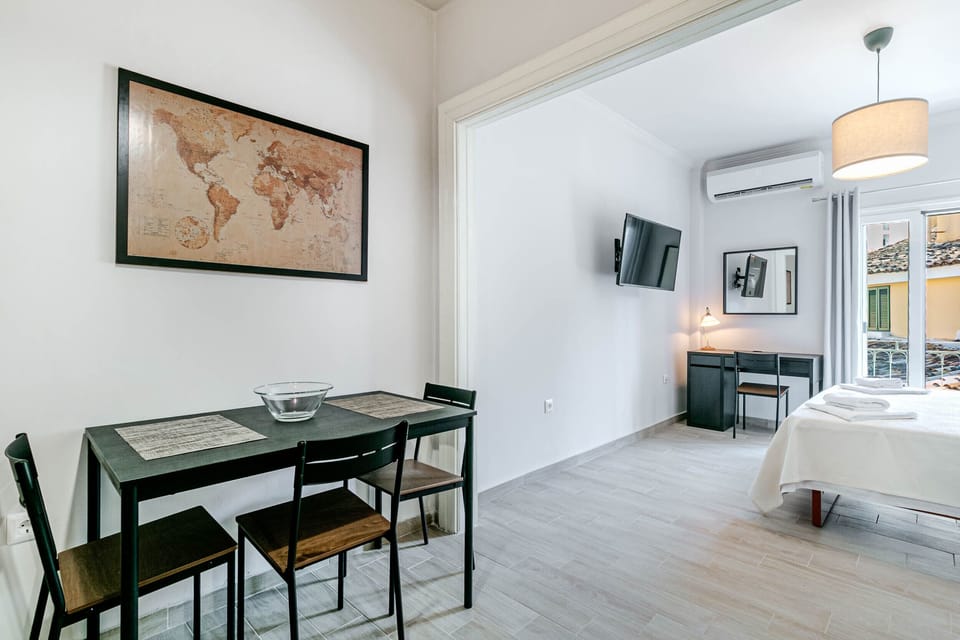 City Apartment | Living area | 50-inch LCD TV with cable channels