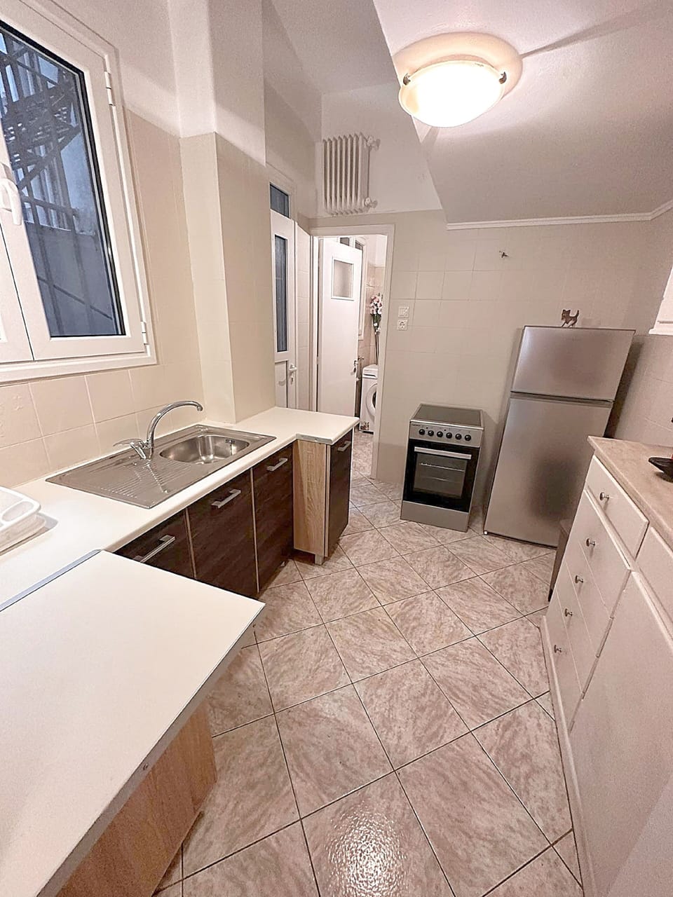 Full-size fridge, oven, stovetop, espresso maker