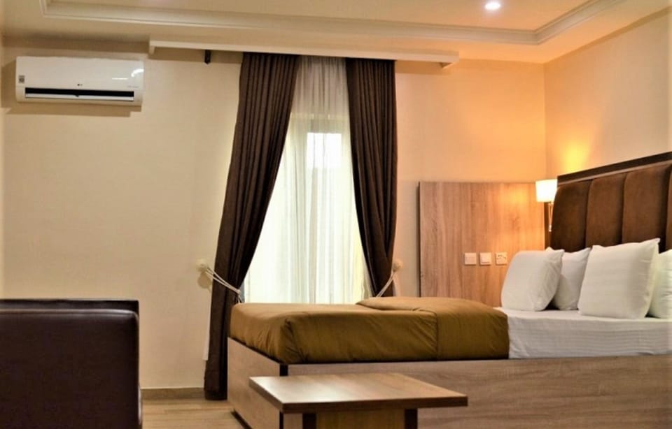 Premium bedding, individually furnished, desk, laptop workspace
