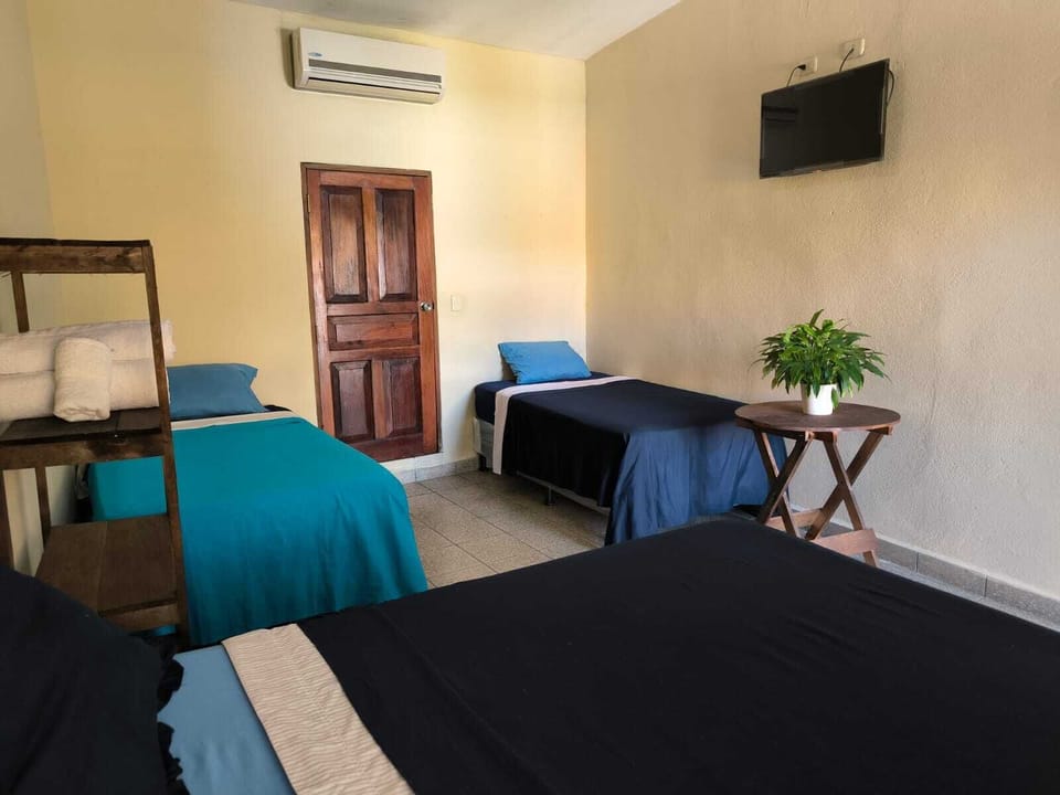 Triple Room | Desk, laptop workspace, blackout drapes, WiFi (free)