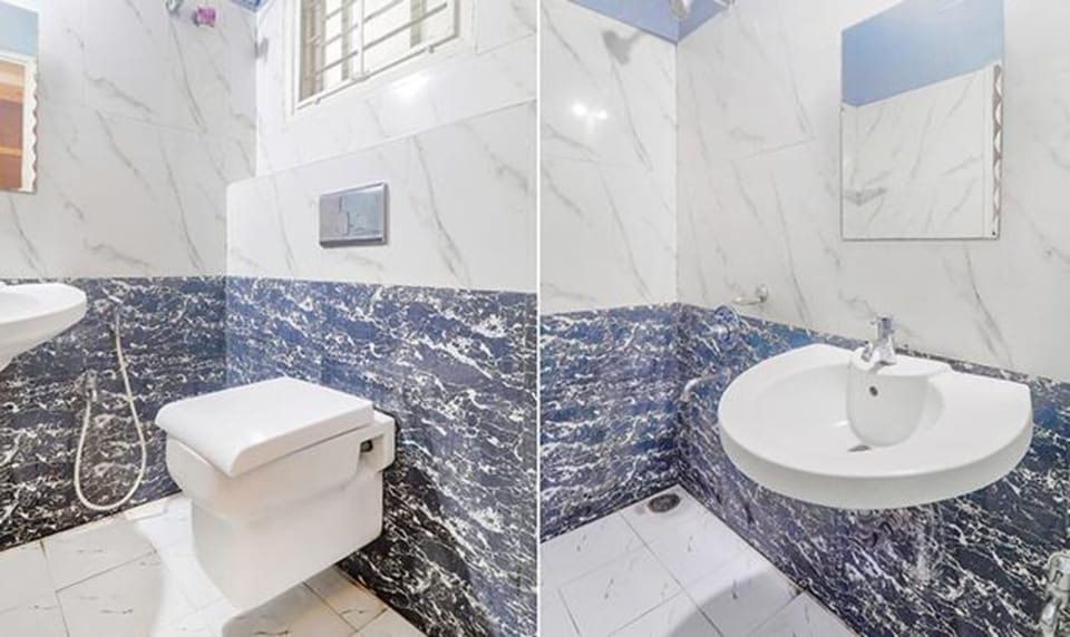 Deluxe Room | Bathroom | Shower, rainfall showerhead, free toiletries, towels