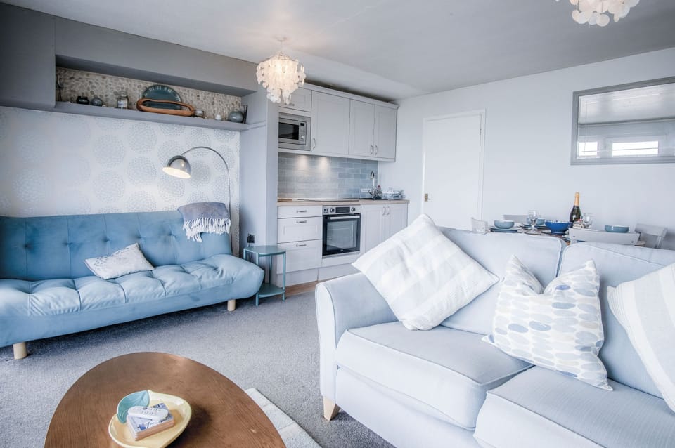 Apartment (2 Bedrooms) | Living area | 32-inch TV with cable channels