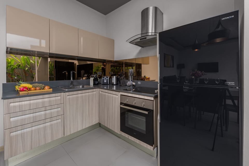 Villa | Private kitchen | Fridge, microwave, stovetop, dishwasher