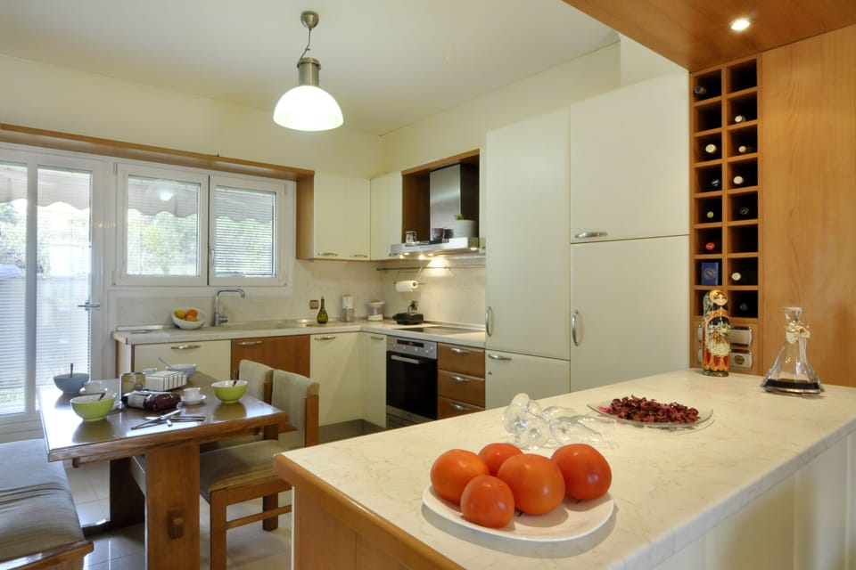 Comfort Apartment | Private kitchen | Full-size fridge, oven, stovetop, electric kettle