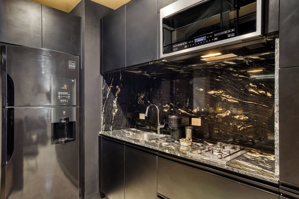 Stylish Apartment with a Private Balcony | Private kitchen | Espresso maker, full-size fridge, microwave, stovetop