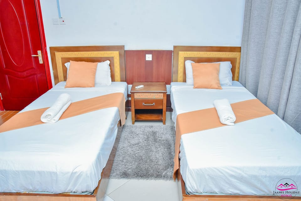 Comfort Apartment, 2 Bedrooms, Sea View | Free minibar items, individually furnished, desk, laptop workspace