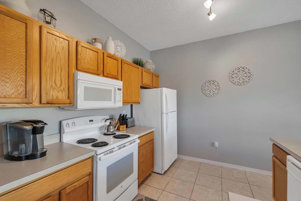 Townhome, Multiple Beds, Pool Access, Pool View (Magic Sunset Villa) | Private kitchen | Fridge, microwave, oven, stovetop