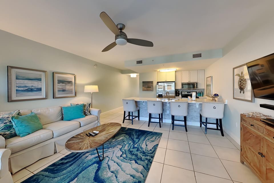 Condo, Multiple Beds, Balcony, Beach View | Living area | 40-inch TV with digital channels