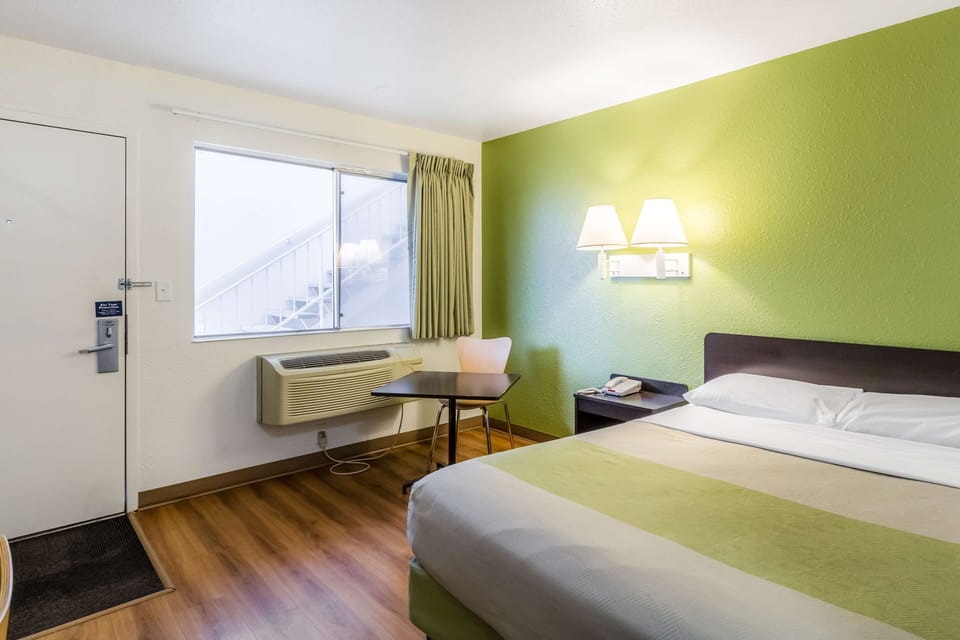 Desk, laptop workspace, free WiFi, bed sheets