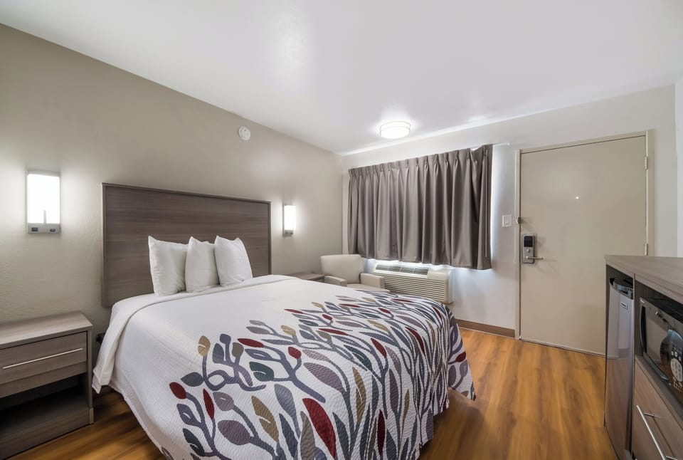 Desk, blackout drapes, cribs (free), WiFi (free)