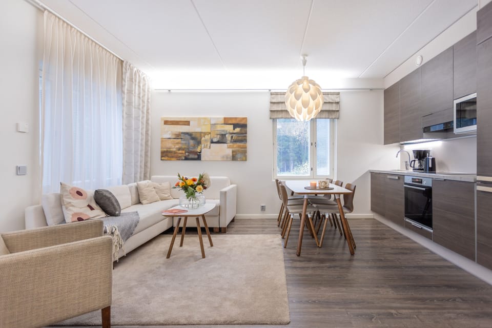 Superior Apartment, 2 Bedrooms, Sauna, Lake View | Living area | 40-inch flat-screen TV with cable channels, streaming services