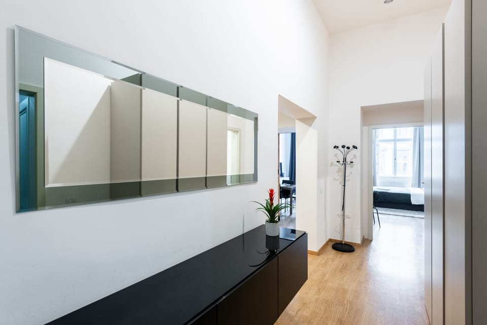 Business Apartment | Living area | 50-inch LED TV with cable channels