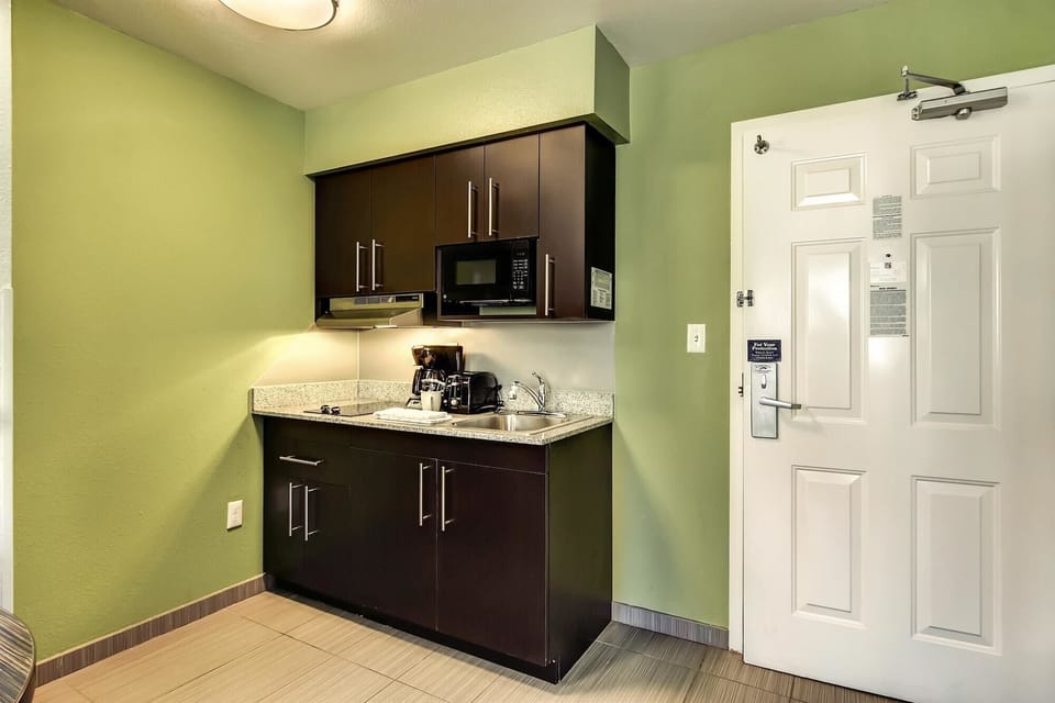 Fridge, microwave, stovetop, coffee/tea maker
