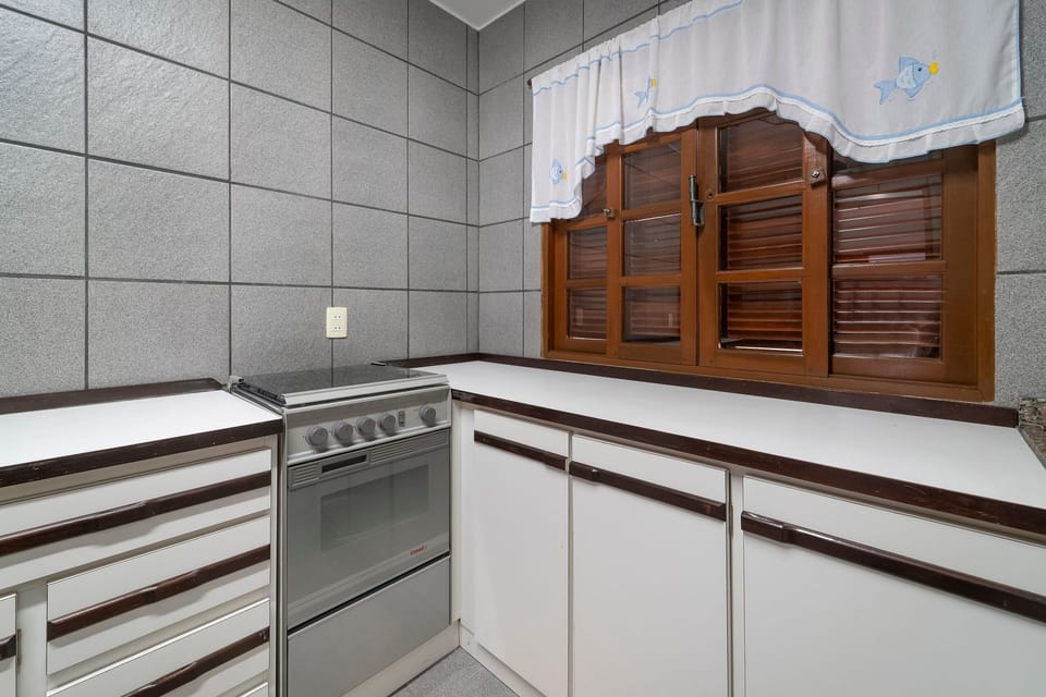 Villa | Private kitchen | Fridge, microwave, cookware/dishes/utensils