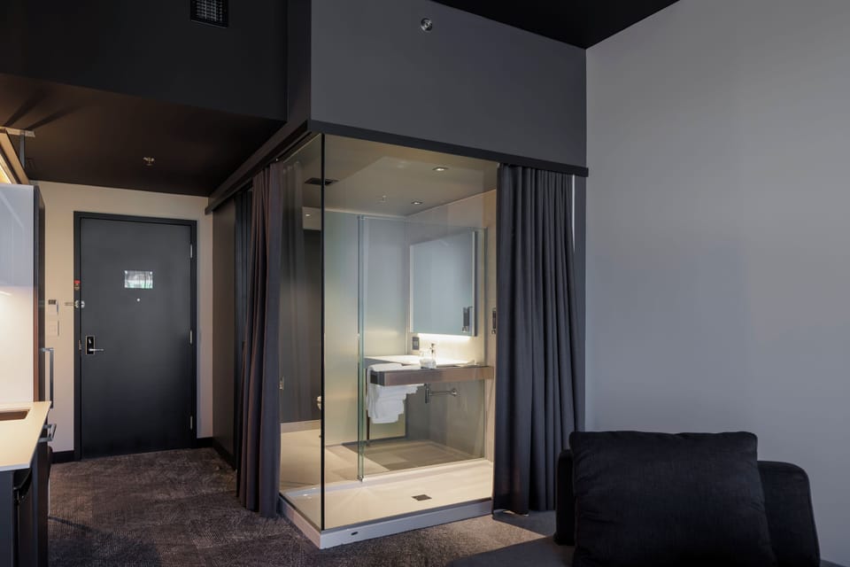 Prestige Suite | Bathroom | Shower, hair dryer, towels, soap
