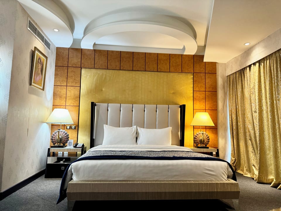 Executive Suite | Desk, blackout drapes, soundproofing, iron/ironing board (on request)