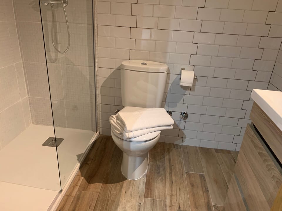 Standard Double Room | Bathroom | Shower, rainfall showerhead, towels, soap