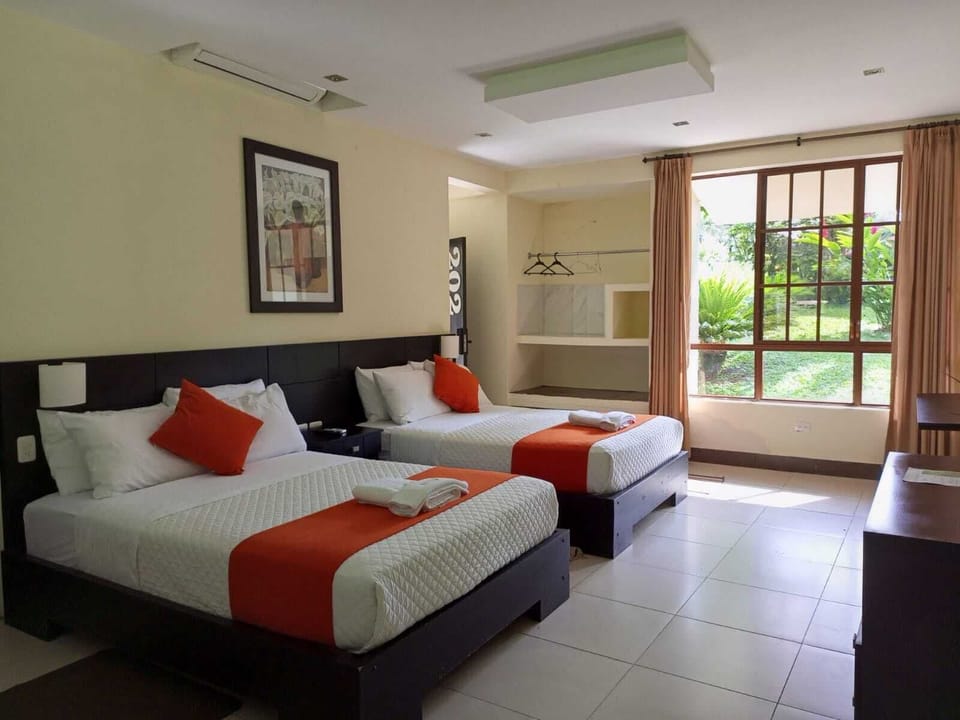 Family Cabin, 2 Double Beds, Hot Tub, Garden View | Hypo-allergenic bedding available, down comforters, minibar, desk