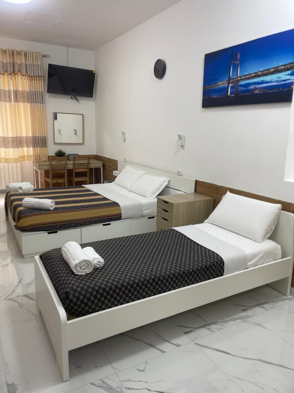 Hypo-allergenic bedding, individually furnished, laptop workspace