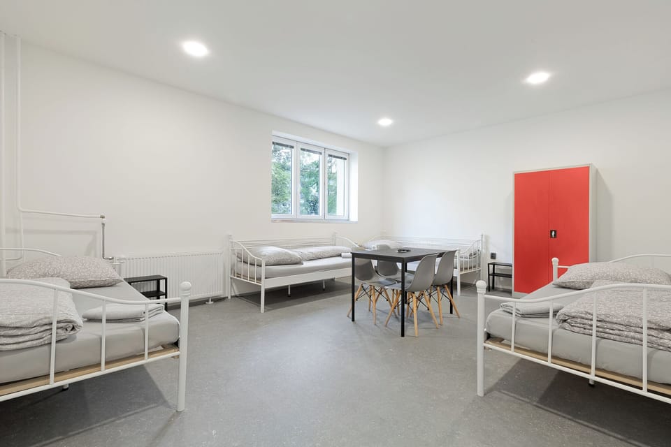 Comfort Quadruple Room | Pillowtop beds, desk, soundproofing, free WiFi