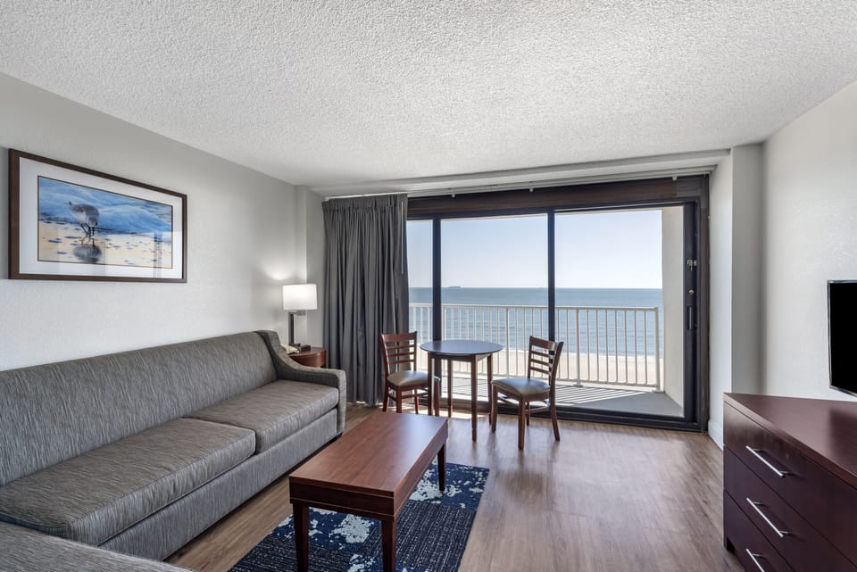 Standard Suite (floors 8 - 10) | Living room | 40-inch TV with satellite channels