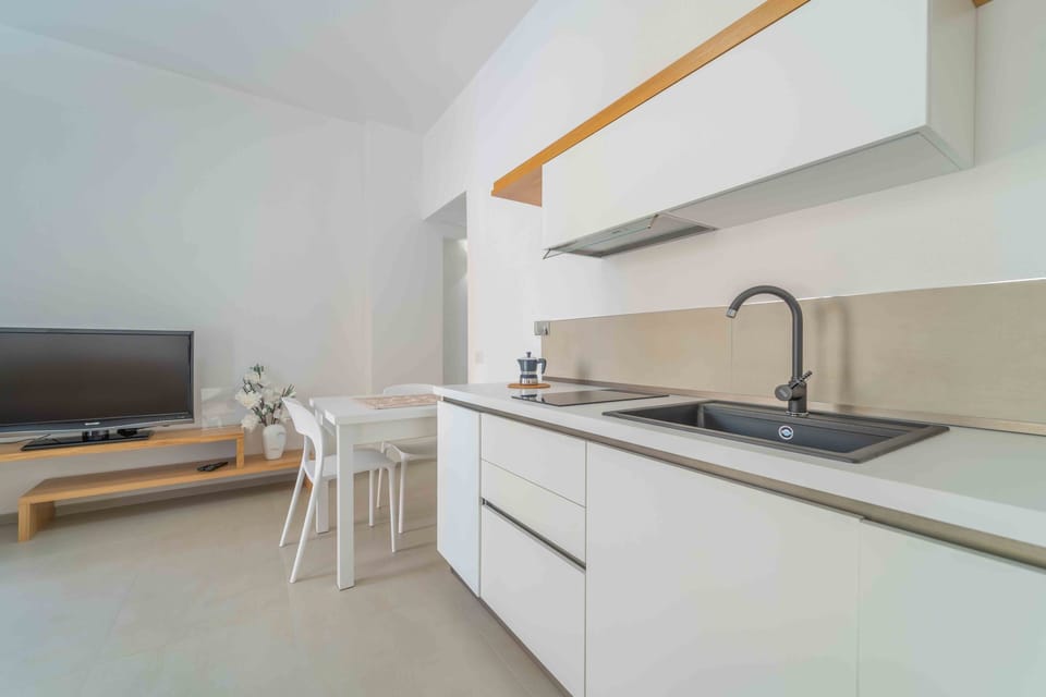 Comfort Apartment | Living area | LED TV, printers