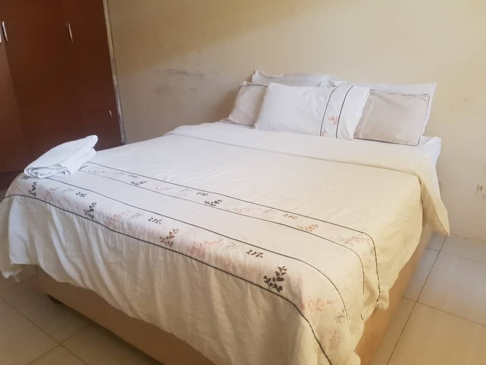 Egyptian cotton sheets, premium bedding, desk, laptop workspace